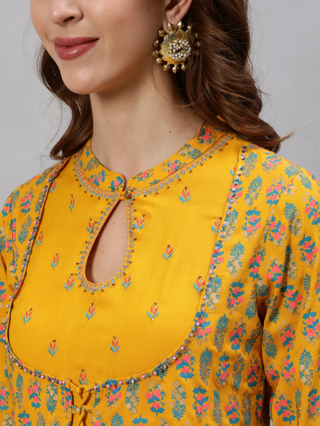 Anubhutee Women Yellow  Blue Floral Printed Empire Kurta With Trousers